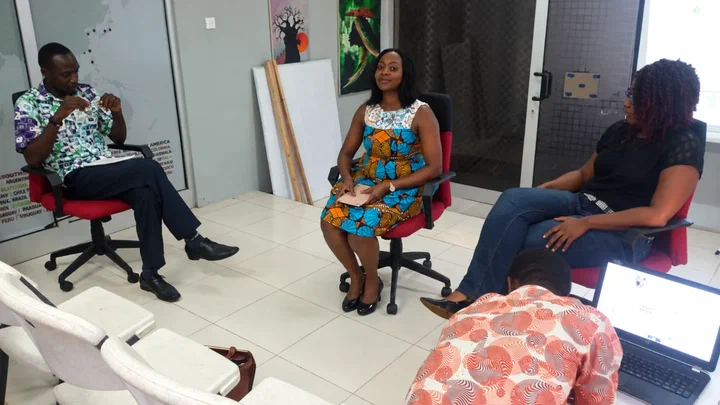 Moderator Dr Thomas Tagoe and panellists Cordie Aziz and Ama Frimpomaa Adjei Ayim seated for the panel at Impact Hub Accra