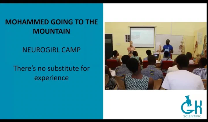GhScientific slide on the NeuroGirl Camp, ’there’s no substitute for experience’, with a photo of a speaker teaching students