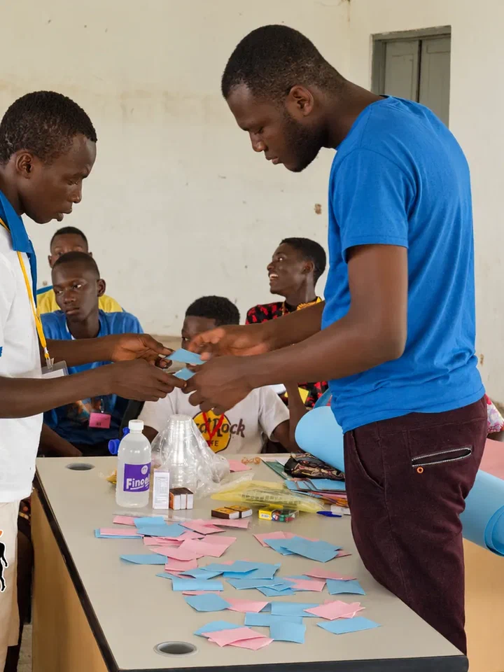 Young people working with paper and materials at the World Changers Camp